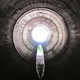 Illustration for article titled Unreal photographs of tunnels look like portals into the underworld